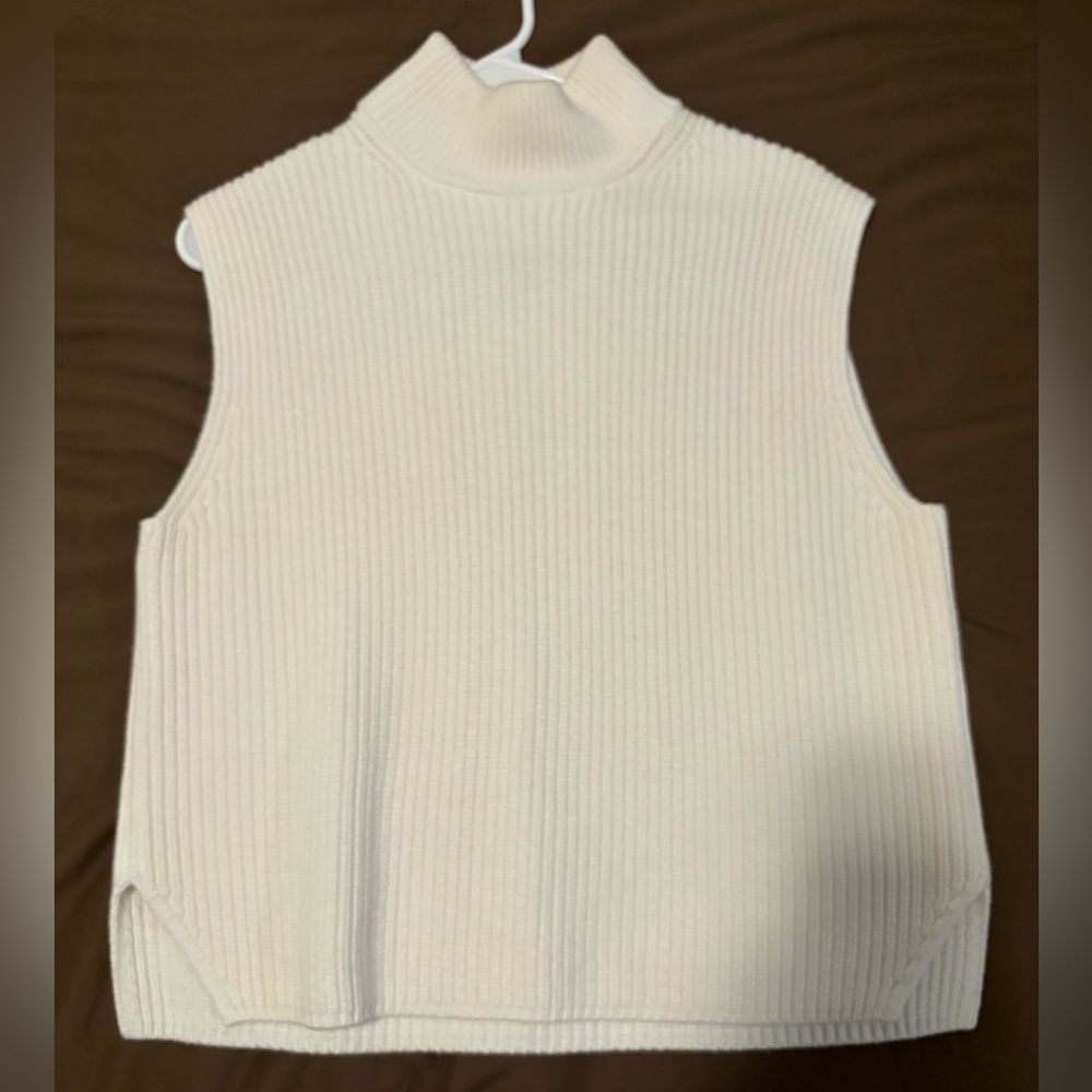White sweater vest